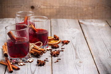 Christmas mulled wine on a rustic wooden table