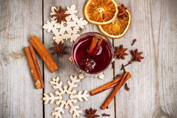 Christmas mulled wine on a rustic wooden table