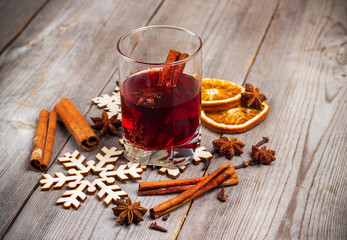 Christmas mulled wine on a rustic wooden table