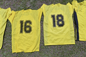 Yellow football shirt with number sixteen, eighteen