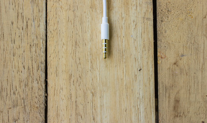 Electrical Plugs on wooden background