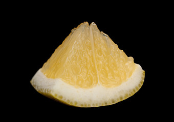 Lemon citrus fruit slice on black © Tatyana Nyshko