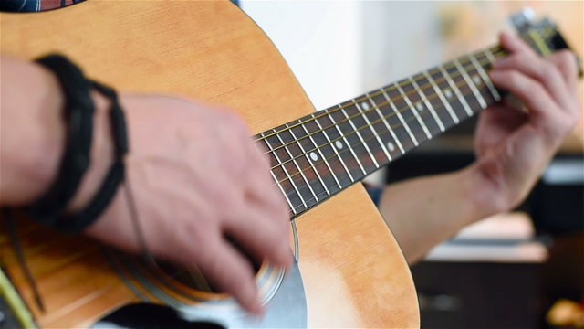 Young Man Playing On A Classical Guitar, Slow Motion