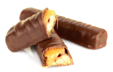 Tasty broken chocolate bars isolated on white background