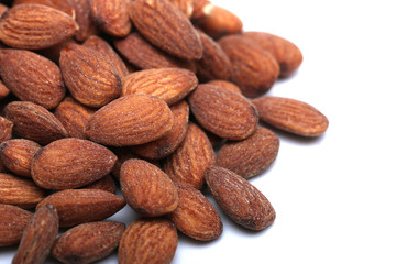 Roasted and Salted Whole Almonds on a White Background