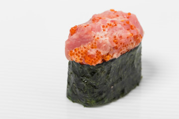Gunkan sushi with tuna.