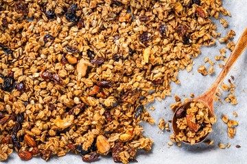 homemade granola with raisins and nuts - obrazy, fototapety, plakaty