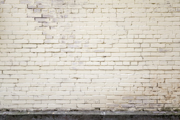 Light yellow old brick wall, background texture