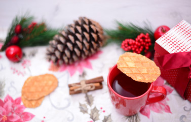 Obraz na płótnie Canvas Hot tea and christmas cookies