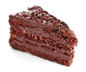 Chocolate cake with chocolate cream isolated on white