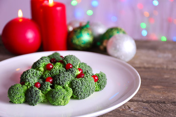 Christmas fir tree made from broccoli, on plate, close up