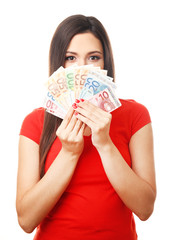 Woman holding money isolated on white
