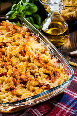 Casserole fusilli pasta with sausage, zucchini and cheese