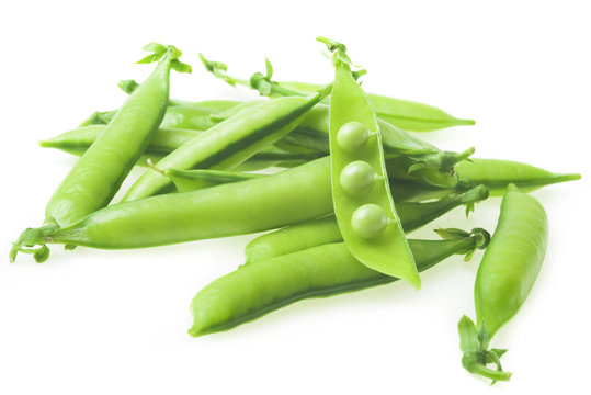 fresh green peas on a white background. Selective focus.
