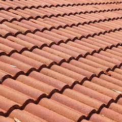 brown tile roof weathered on building residential