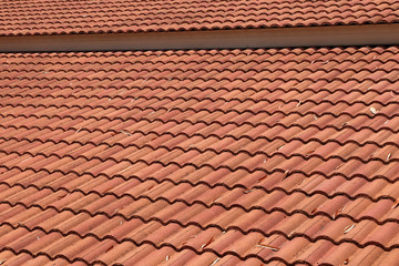brown tile roof weathered on building residential