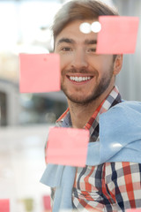 Attractive male worker is trying to understand something