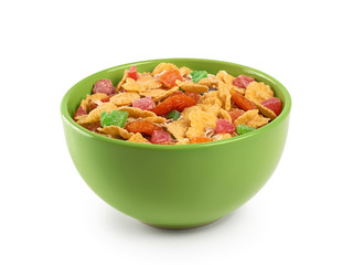 Bowl of muesli and dried fruit isolated on a white background.
