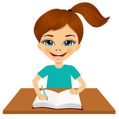 cute little caucasian student girl writing