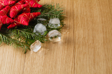 meltel ice on oak table background