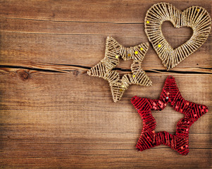 Christmas background. Snowflakes border on grunge wooden board.