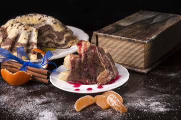 freshly baked cake. cinnamon sticks 