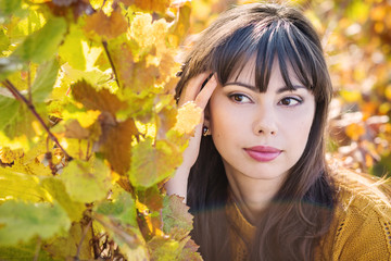 Autumn portrait of a young woman