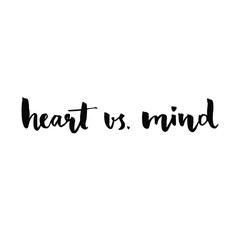 Heart vs mind. Phrase handwritten with black ink and brush, custom lettering for posters, t-shirts and cards. Vector calligraphy isolated on white background
