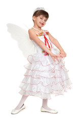 tooth fairy girl dressed in white with wings