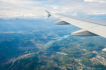 Fototapeta premium Airplane wing out of window