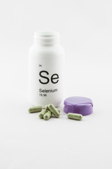 Open bottle of selenium vitamins