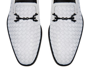 Tip of male shoes isolated on white