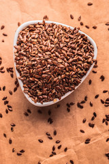 Flax seeds linseed in white bowl