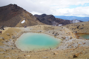 Water-filled explosion craters called the Emerald Lake