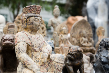 Chinese old sculptures in stone at a flea market