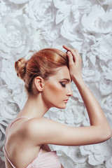 Portrait of young beautiful red-haired girl. Fashion photo