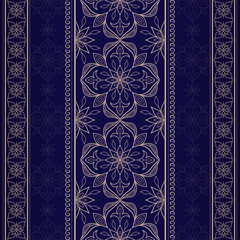 Filigree seamless lace golden border on dark blue.