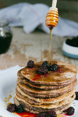 Whole wheat oatmeal pancakes with blackberry and syrup