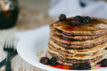 Whole wheat oatmeal pancakes with blackberry and syrup