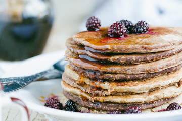 Whole wheat oatmeal pancakes with blackberry and syrup