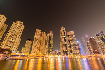 Fototapeta na wymiar Dubai - JANUARY 10, 2015: Marina district on January 10 in UAE, Dubai. Marina district is popular residential area in Dubai