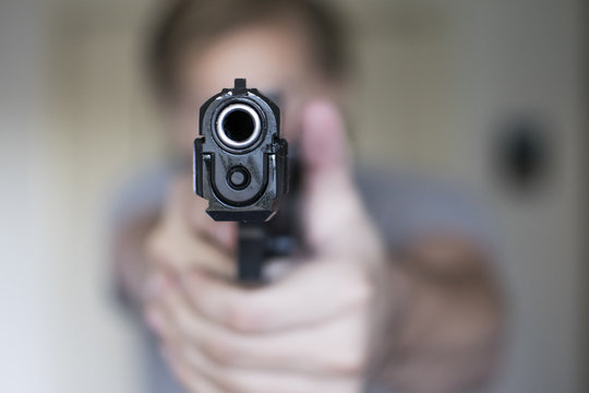Man drawing handgun in home in self defense