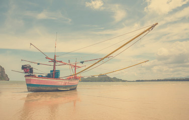 Fototapeta na wymiar Thai fishing boat used as a vehicle for finding fish in the sea.