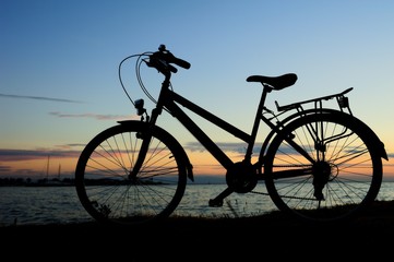 Fototapeta na wymiar Bicycle Silhouette at sunset