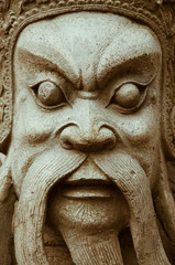 Fototapeta na wymiar Chinese Stone Statue Is The Doorguard of Sacred Place.