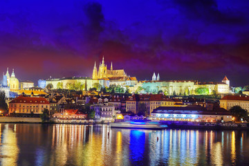 Fototapeta na wymiar View of Prague Castle famous historic bridge that crosses the Vl