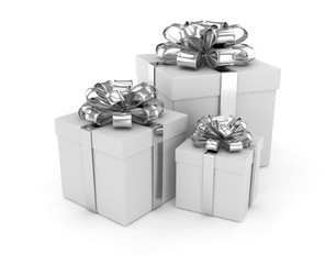 three gift boxes with bows isolated on white