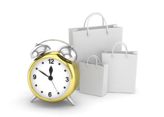 alarm clock and shopping bag (time to buy concept)