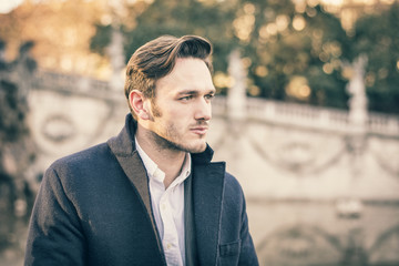 Handsome young man outdoor in winter fashion