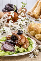 Sausage with plums and onion